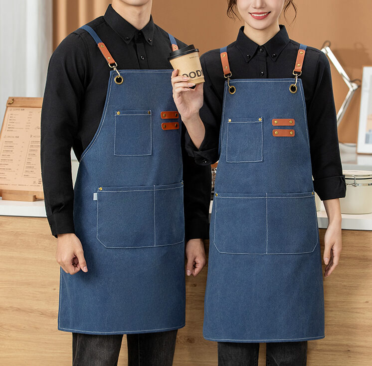 Custom 12 oz washed canvas apron with leather straps and large front pocket for wholesale restaurant and cafe uniforms