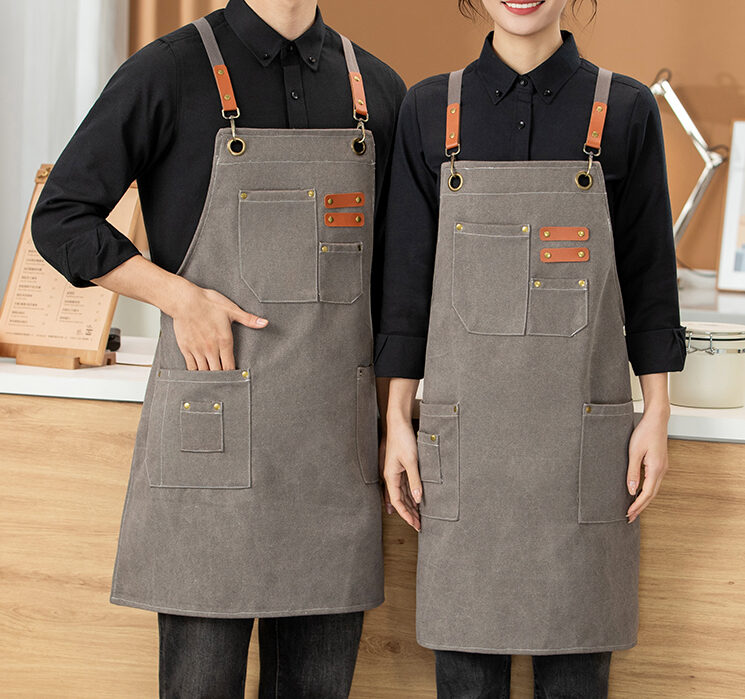 Custom washed canvas apron with leather straps and multi pockets for wholesale restaurant and cafe uniforms