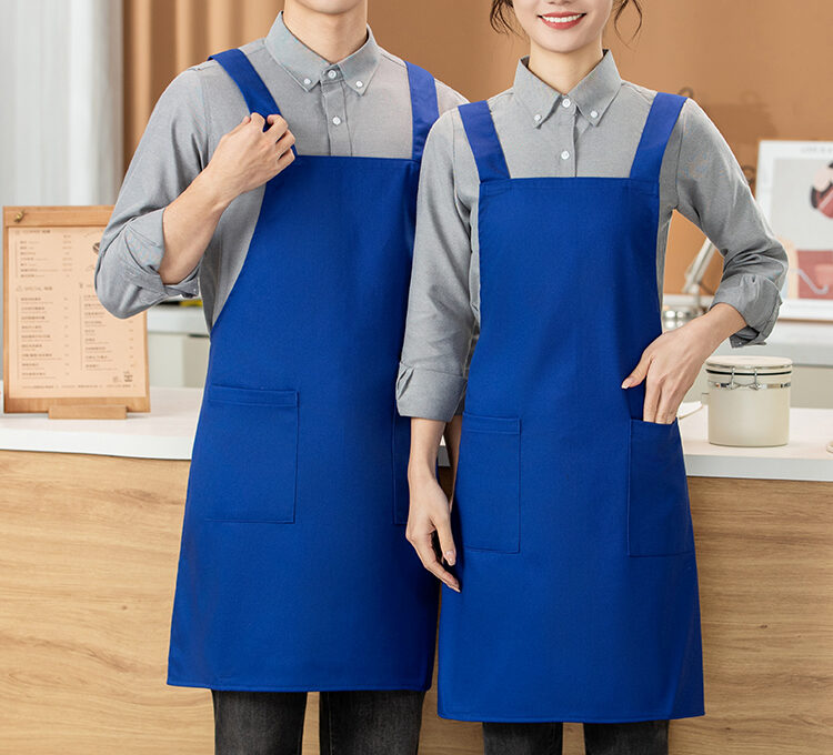 Flame retardant cotton twill bib apron with double front pockets 8803 Flame retardant apron fabric close up Blue cotton twill apron with large front pocket Custom flame retardant workwear apron for bulk orders Durable cotton twill apron with reinforced stitching