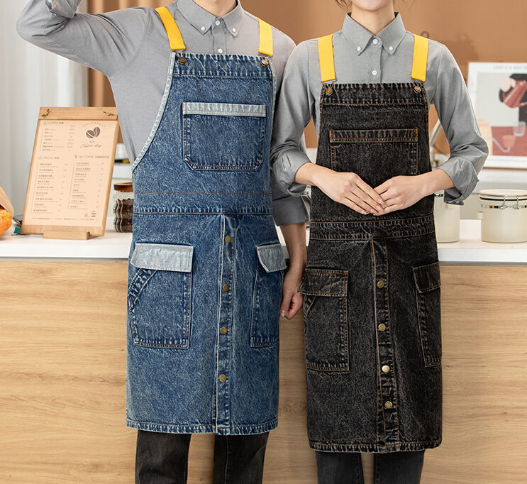 N302 vintage washed denim cross back apron with shoulder straps and multiple front pockets