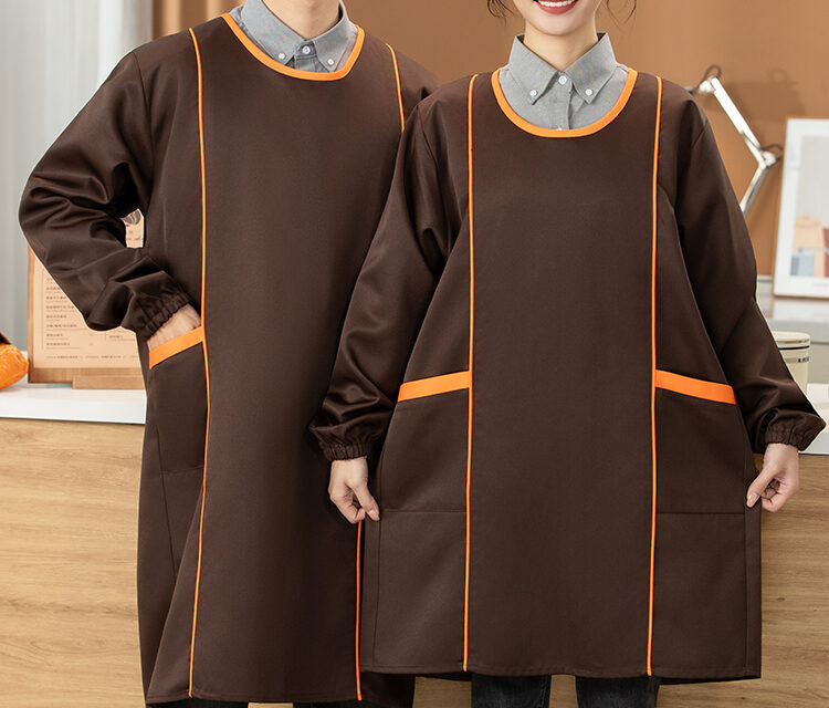 Adult waterproof long sleeve apron with front pockets and contrast piping for kitchen, cleaning, and workwear use.